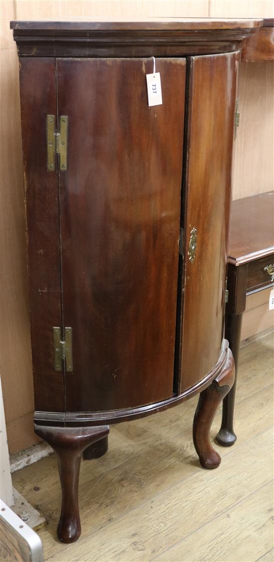 A George III mahogany bowfront corner cabinet on later cabriole legs W.78cm